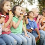 children eating ice cream at the zoo
